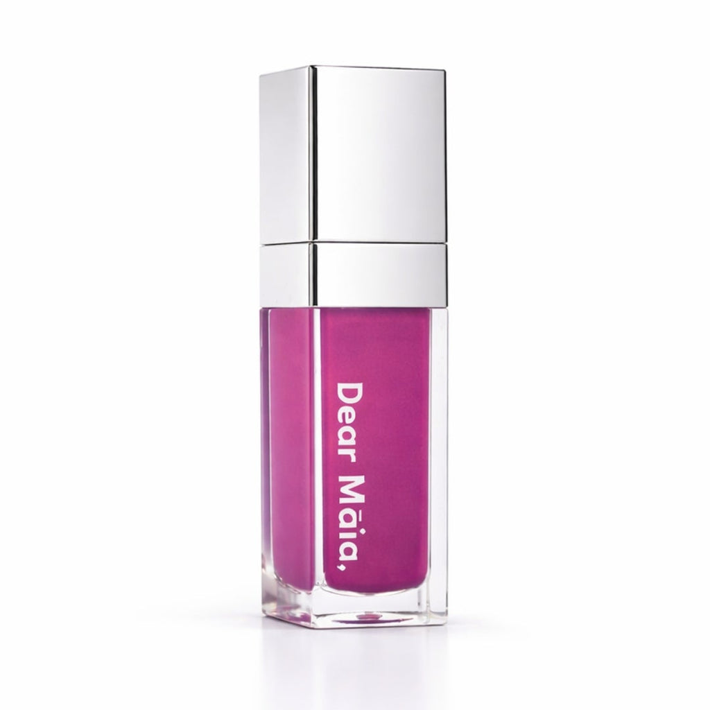 Luminous liquid blush acrylic bottle with silver cap and a purple blush shade inside on a white background with the Dear Māia logo