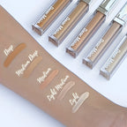 Flawless Awakening Serum Concealer displayed on a hand with swatches, set against a white background.