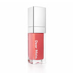 Luminous liquid blush acrylic bottle with silver cap and a muted rose pink blush shade inside on a white background with the Dear Māia logo