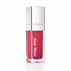 Luminous liquid blush acrylic bottle with silver cap and a hot pink blush shade inside on a white background with the Dear Māia logo